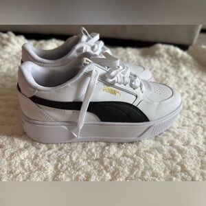 Puma White and Black Platform Sneakers with Gold Accents